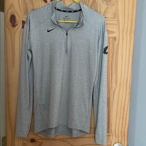 Nike Dri FIT Light Gray Cleveland caviliers running top.